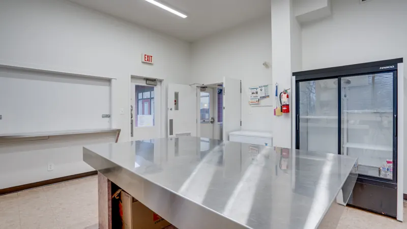 Kitchen with commercial fridge